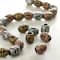 12 Pack: Multicolor Metal Plated Antique Barrel Beads, 10mm by Bead Landing™